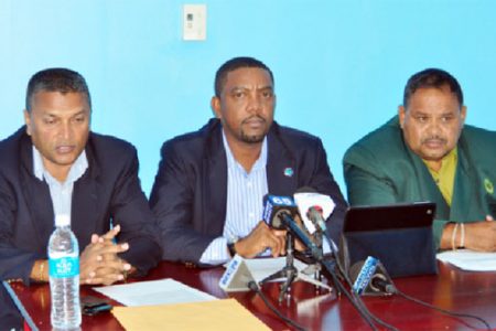 SHOW OF SUPPORT! West Indies Cricket Board president Whycliffe Cameron is flanked by Guyana Cricket Board president Drubahadur and Secretary Anand Sanasie, left. (Orlando Charles photo)