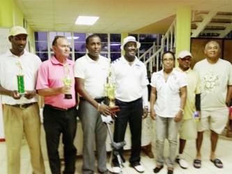 Winner Alfred Mentore (third left), Rev. Dr. Philbert London with other winners and representatives of Beacon Ministries and the LGC. 