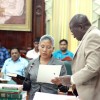 The oath of an MP being administered to Rennita Williams yesterday by Clerk of the National Assembly, Sherlock Isaacs.