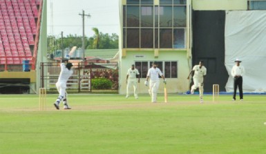 Jermaine Blackwood drives Ronsford Beaton over the top for a boundary