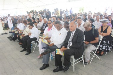 From right in front row are Speaker of the National Assembly Raphael Trotman, Prime Minister Sam Hinds and his wife Yvonne Hinds. 