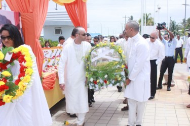 Reepu Daman Persaud’s doli being borne into the International Convention Centre yesterday