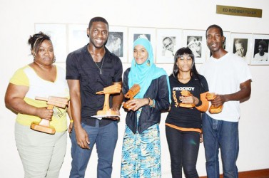 From left: Slam Champ Rochelle Christie, first runner-up Yerredin Akeel Bowen, third runner-up Salimah Husain, fourth runner-up Latoni Beaton and second runner-up Randolph Critchlow. 