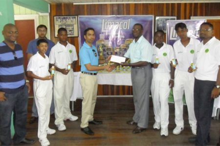Guyana Cricket Board’s Competitions Committee Chairman Colin Europe (5th from right), accepts the sponsorship cheque from New GPC Inc. Marketing Manager Trevor Bassoo, while other GCB and New GPC Inc. executives and players look on.
 
 
 
