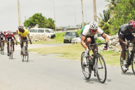 BEAST MODE! National cyclist, Alonzo Greaves (left) in action during one of his three victories yesterday at the Roraima Bikers Club (RBC) and Caribbean International Distributors Inc. inaugural 10-race cycle meet. (Orlando Charles photo)
