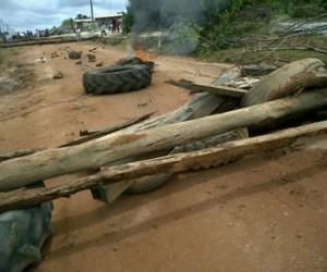 The tyres and logs that were used to block the road 