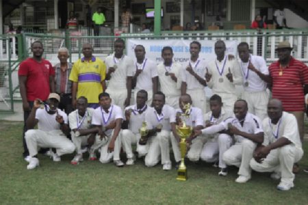 CHAMPS! Police Sports Club poses with the silverware 