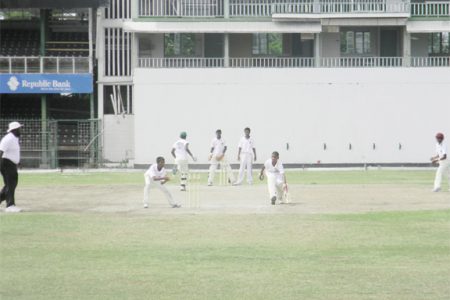Action in the game between defending champions Berbice and the President’s XI at the Georgetown Cricket Club ground Bourda yesterday.