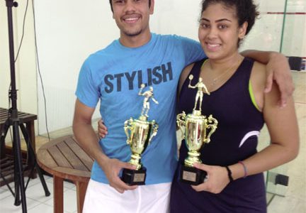 FAMILY AFFAIR! Siblings Jason Ray  and Ashley Khalil won the men’s and women’s singles of the Ansa Mc Al-sponsored senior Easter squash tournament which ended yesterday at the Georgetown Club.