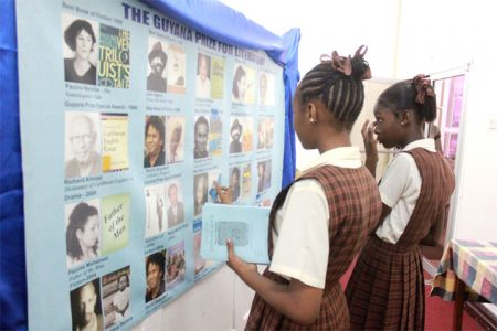 Students viewing a section of the exhibition yesterday (Photo by Arian Browne)