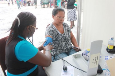 A member of the public having her blood pressure tested (Photo by Arian Browne) 
