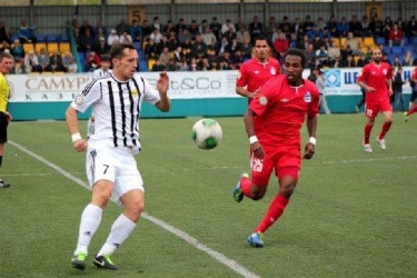 Walter Moore (right, front) during his game last Wednesday against Tobol Kostanai FC at the Uskamen Stadium, Kazakhstan.