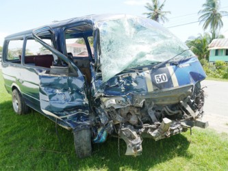 The badly mangled minibus