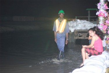 These two girls didn’t seem to care that the road was flooded last evening 