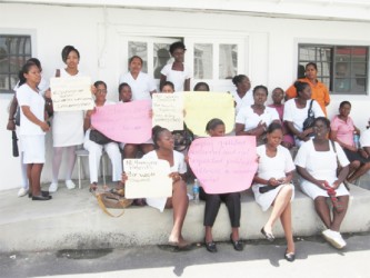 Nurses from the West Demerara Regional Hospital on the first day of a sit-in yesterday as they await a response from the regional authorities on the issues they want addressed 