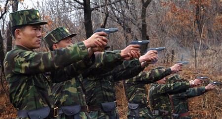 North Korean soldiers take part in a shooting drill in an unknown location in this picture taken on April 6, 2013 and released by North Korea's official KCNA news agency in Pyongyang on April 7, 2013.
REUTERS/KCNA