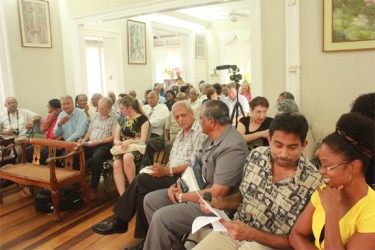 A section of the audience at yesterday’s Moray House launch of The Sky’s Wild Noise: Selected Essays, by Dr Rupert Roopnaraine, which won the Bocas Caribbean Literature Fest 2013 prize for Non Fiction. (Photo by Arian Browne)