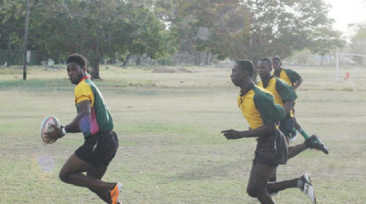 National star player, Claudius Butts evades opposition in yesterday’s national trials.