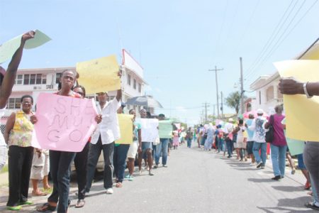 Sooba must go! These protesters chanted as they protested in front of the Ministry of Local Government in Kingston yesterday

