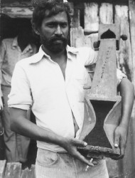 Man from Hope Estate displaying a locally-made,  nineteenth-century sarangi which had been handed down to him (photo, 1976)