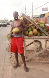 Hilton Nedd at his water coconut stand
