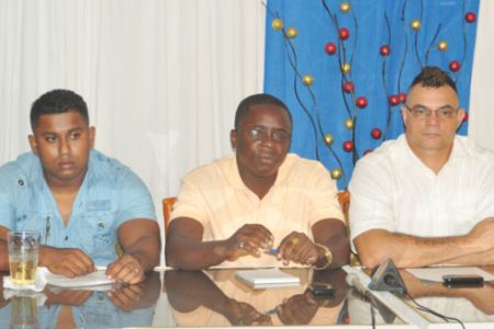 President of the GABBFF, Keavon Bess, (centre) makes a point at Saturday’s Novices Championships launch at the Wind Jammer International Hotel as Organising Secretary,Videsh Sookram (left) and Committee Member, Kirk Jardine look on. (Orlando Charles photo)
