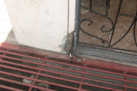 The door from which the hinge was broken off