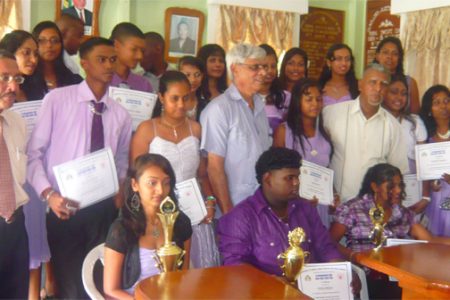 The graduating students posing with regional chairman, Bindrabhan Bisnauth (fourth from right) and officials from the Ministry of Finance