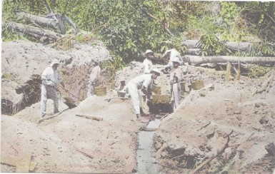 Working in the goldfields, circa 1930 (?) (Photo from a postcard courtesy of Mr David Balderston) 