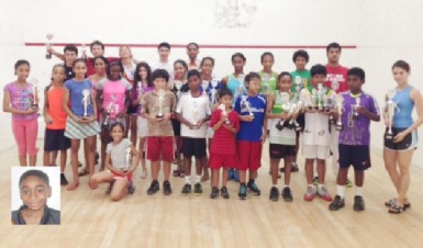 The top performers at the conclusion of the Woodpecker Products Limited sponsored national squash championships which took place yesterday at the Georgetown Club. (Inset) Shomari Wiltshire