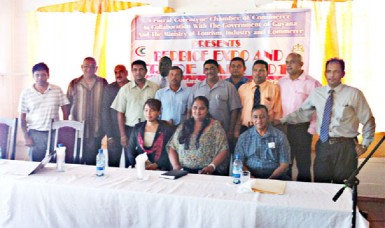 Director of the Guyana Tourism Authority, Indranauth Haralsingh and Region Six chairman, David Armogan with members of Central Corentyne Chamber of Commerce at the launch of Berbice Expo 2013.  