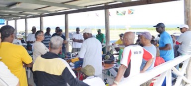 West Indies captain Paul Slowe (second right) meeting with regional shooters Sunday.     