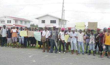 Sugar workers from the Blairmont estate during the picketing exercise in front of Freedom House at Bath, West Coast Berbice yesterday morning
