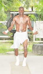 HE’S BACK!Former World Boxing Association (WBA) welterweight champion, Andrew ‘SixHead’ Lewis was photographed working out yesterday at the gym named in his honour ahead of his bout with Jamaican, Sakima Mullings. (Orlando Charles photo)