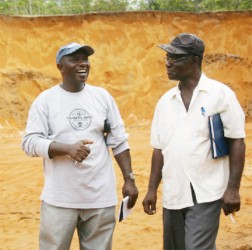 Arthur Reynolds (left) and Maurice Butters (right) at the laterite pit. 