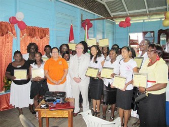 Luan Falconer (sixth from right) in front row and Canadian High Commissioner, David Devine (fifth from right in front row) with the participants.  