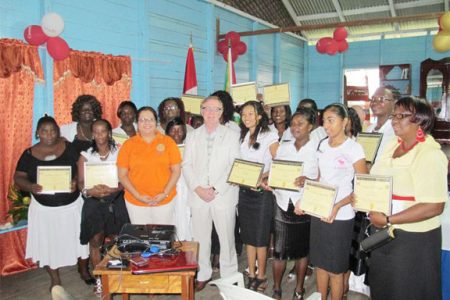 Luan Falconer (sixth from right) in front row and Canadian High Commissioner, David Devine (fifth from right in front row) with the participants.
