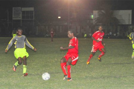 Action in the GFA Players Cup between Flamingo and Black Pearl.