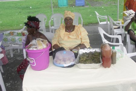 Women selling food items at Kreole Day on Sunday