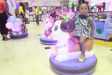 Small children sampling the rides at the Princess Hotel Fun City opening yesterday (Photo by Arian Browne) 