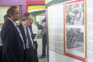 Minister of Culture, Youth and Sport Dr. Frank Anthony viewing the exhibits at the Independence Exhibition (Government Information Agency photo) 