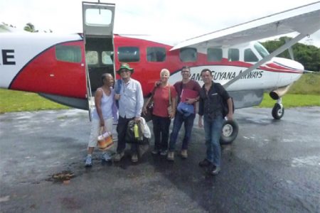 Michael Gilkes (second, left) and some of the crew at Annai
