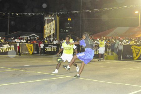 Action in the Guinness of the Streets National Championships between Silver Bullets in black and Leopold Street in yellow.