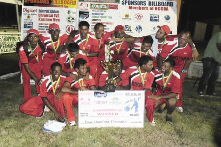 CHAMPS AGAIN! Universal DVD Berbice Titans after their triumph on Sunday over the Georgetown Lions.
