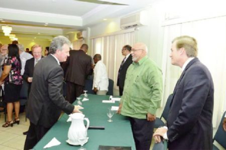 Flashback: President Donald Ramotar (second from right)  in talks with British High Commissioner Andrew Ayre and United States Ambassador to Guyana Brent Hardt during the stakeholders’ meeting on Financial Crimes here on April 17 at the Grand Coastal Inn (GINA photo)
