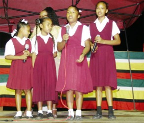 Hururu Primary School students reciting a poem.