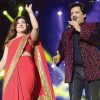 Bollywood playback singers Alka Yagnik, left, and Udit Narayan on stage at the Centre of Excellence, on Saturday night. (Trinidad Express photo)