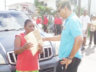 One of the Clarkes complaining to Minister Robert Persaud about her problems