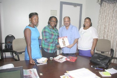 Minister of Health, Dr Bheri Ramsaran (second from right) meeting with the President of the Women’s Miners Association Simona Broomes (second from left) and other members of the association 