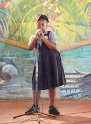 Keisha Conway performing “Time to Clean it Up”. The Winfer Gardens Primary School student thoroughly entertained the crowd while addressing the garbage crisis in Georgetown. 
